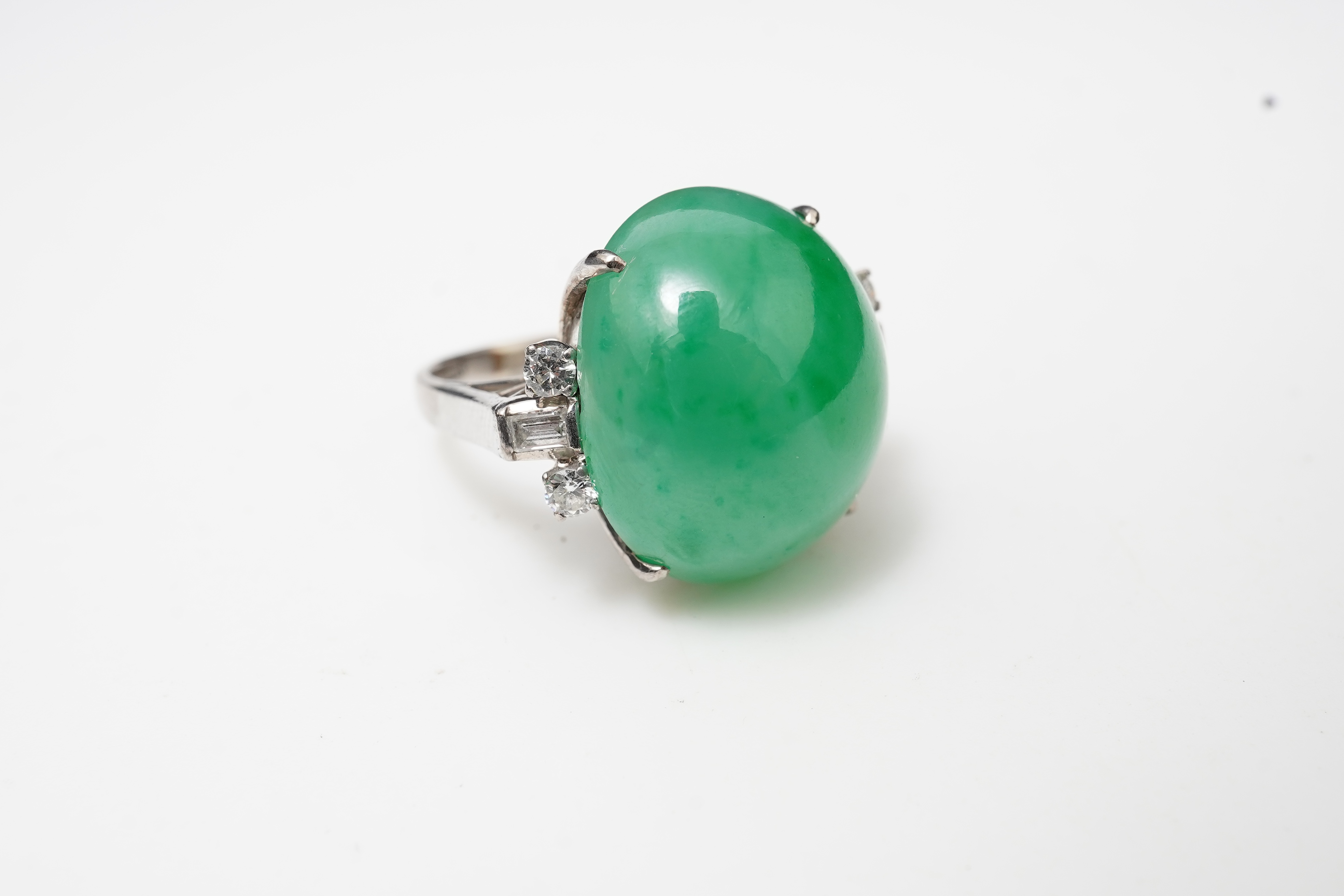 A jadeite and diamond ring